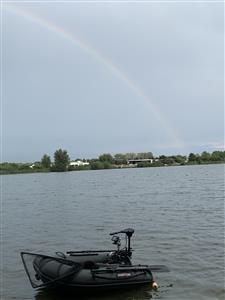 regenboog en boot